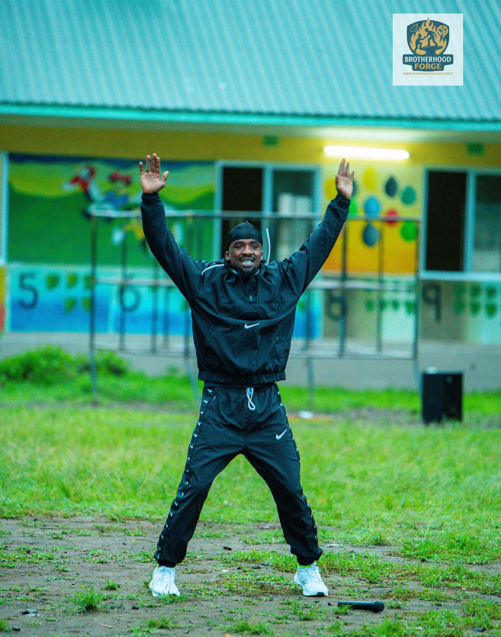 Brotherhood Forge participants in a movement-led warm-up session