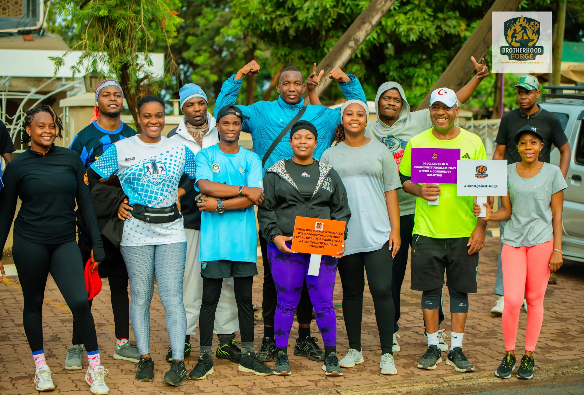 Brotherhood Forge participants standing together during a public awareness activation
