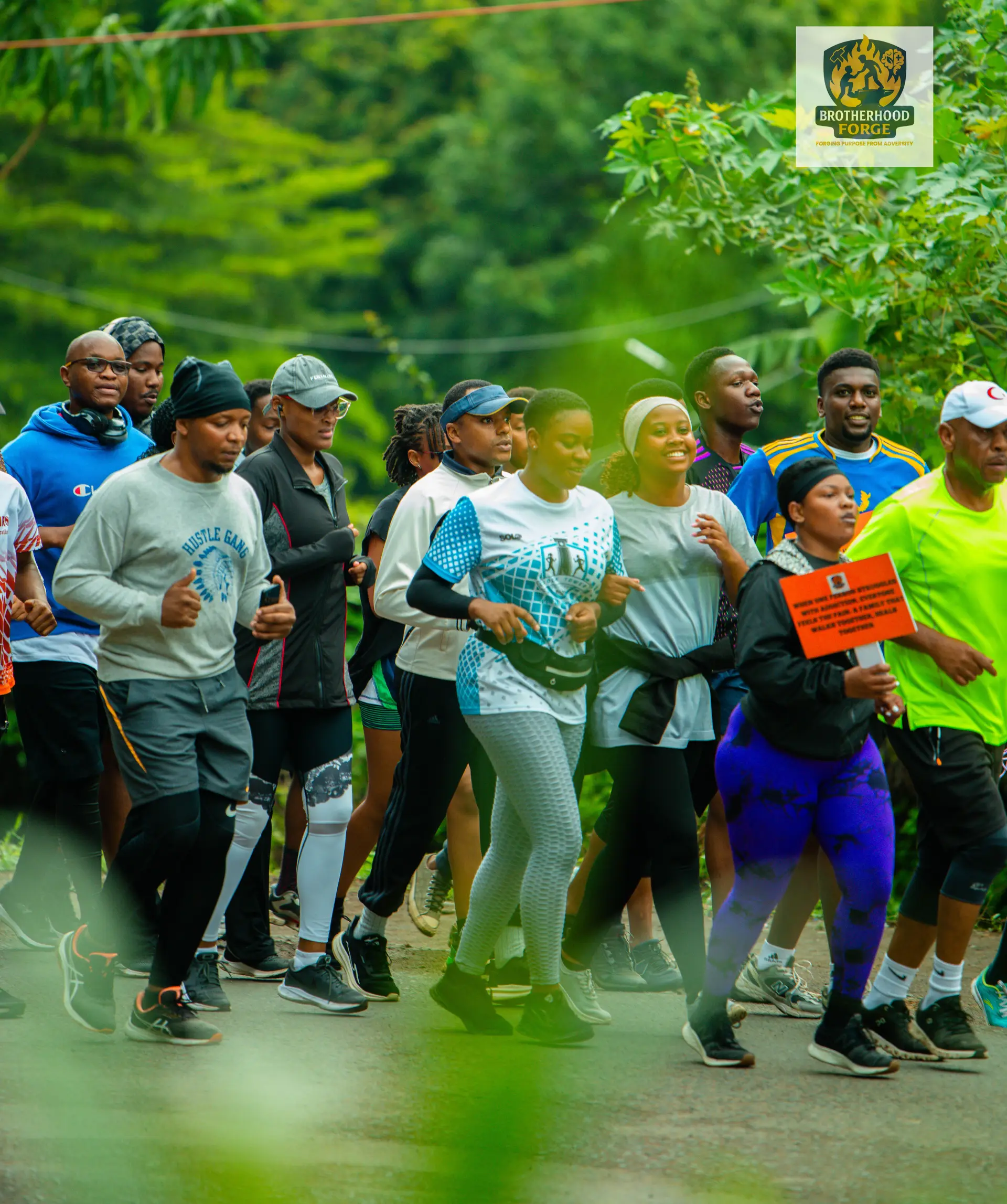 Brotherhood Forge participants moving together through a public community action